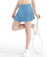 Load image into Gallery viewer, DOCUMO Pleated Skirts for Girls with Pocket Shorts Girls Athletic Golf Tennis Skorts Hight Waisted Skirts for Running Casual (Light Blue, Large)