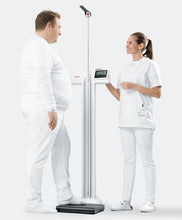 Load image into Gallery viewer, Seca 777 Medical Scale – Professional Physician Scale - Accurate Weight with Consistent Results and BMI - Eye Level Height Rod and Tilt Proof Safety - Weight Capacity 550 lbs / 220 kg