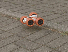 Load image into Gallery viewer, LEXiBOOK- Crosslander Luminous Terrain Car, Wrist Remote, Rechargeable, Electronic Action Kit, White/Orange, Color