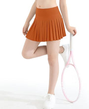 Load image into Gallery viewer, DOCUMO Pleated Skirts for Girls with Pocket Shorts Girls Athletic Golf Tennis Skorts Hight Waisted Skirts for Running Casual (Orange, Small)
