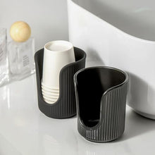 Load image into Gallery viewer, Dobbyby Ceramic Bathroom Cup Dispenser with Stylish Vertical Stripes - Disposable Mouthwash Cup Holder Holds 3-4oz Paper Cups for Rinsing Cups on Bathroom Vanity Countertops (Matte Black)

