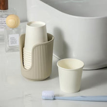 Load image into Gallery viewer, Dobbyby Ceramic Bathroom Cup Dispenser with Stylish Vertical Stripes - Disposable Mouthwash Cup Holder Holds 3-4oz Paper Cups for Rinsing Cups on Bathroom Vanity Countertops (Matte Beige)
