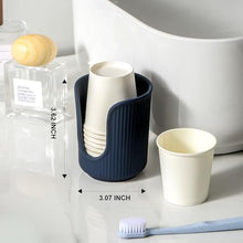 Load image into Gallery viewer, Dobbyby Ceramic Bathroom Cup Dispenser with Stylish Vertical Stripes - Disposable Mouthwash Cup Holder Holds 3-4oz Paper Cups for Rinsing Cups on Bathroom Vanity Countertops (Matte Blue)
