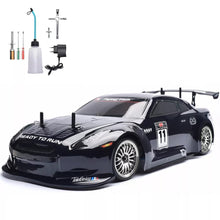Load image into Gallery viewer, RC Buggy 1/10 Professional High-Speed Drift Remote Control Cars Nitrogen Drive 4WD 80KM/H Metal Chassis Gas RC Truck 2.4GHZ
