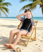 Load image into Gallery viewer, DOCUMO Girls Rash Guard Swimsuit 2-Piece Short Sleeve Colorblock Quick Dry Bathing Suit UPF 50+ Beach Swimwear Size 6-15Y (Leopard# Black, X-Large)
