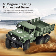 Load image into Gallery viewer, 50 Minutes Playing Time RC Military Truck, JJRC Q69 Off-Road Remote Control Car 2.4Ghz 4WD 1:18 Scale
