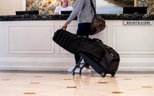 Load image into Gallery viewer, Sun Mountain ClubGlider Meridian Golf Travel Bag - 4-Wheel Rolling System, Extendable &amp; Retractable Legs for Easy Transport, Effortless Travel &amp; Maneuverability - Rush-Black-Gunmetal
