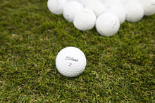 Load image into Gallery viewer, Clean Green Golf Balls 50 Golf Ball Mix of Titleist Pro V1 and Pro V1x. Recycled and Used Titleist Pro V1 Golf Balls, Pro V1x Golf Balls - Includes Mesh Carrying Bag - As Seen on Shark Tank
