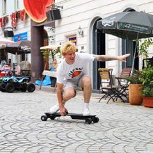 Load image into Gallery viewer, Electric Skateboards with Remote, 1200W Powerful Motor,28MPH Top Speed,4/6AH Large Battery,16/18Miles Long Range (Bright Yellow(4AH))
