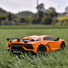 Load image into Gallery viewer, Remote Control Car Licensed RC Car, 1:24 Lambo Toy Car for Kids, Lambo SVJ Remote Control Model Car Electric (Orange)
