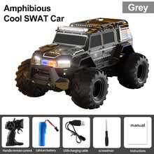 Load image into Gallery viewer, 9IMOD 1/16 RC Car Amphibious Stunt Vehicle 2.4G 4WD Police Car Waterproof Climbing Off-road Vehicle Cool Lights Dynamic Music
